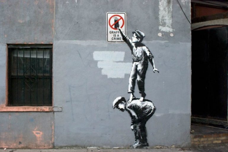 THE RISE OF STREET ART POPULARITY THROUGH THE ANONYMITY OF BANKSY